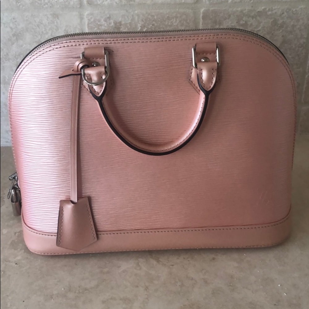 Alma PM Louis Vuitton satchel